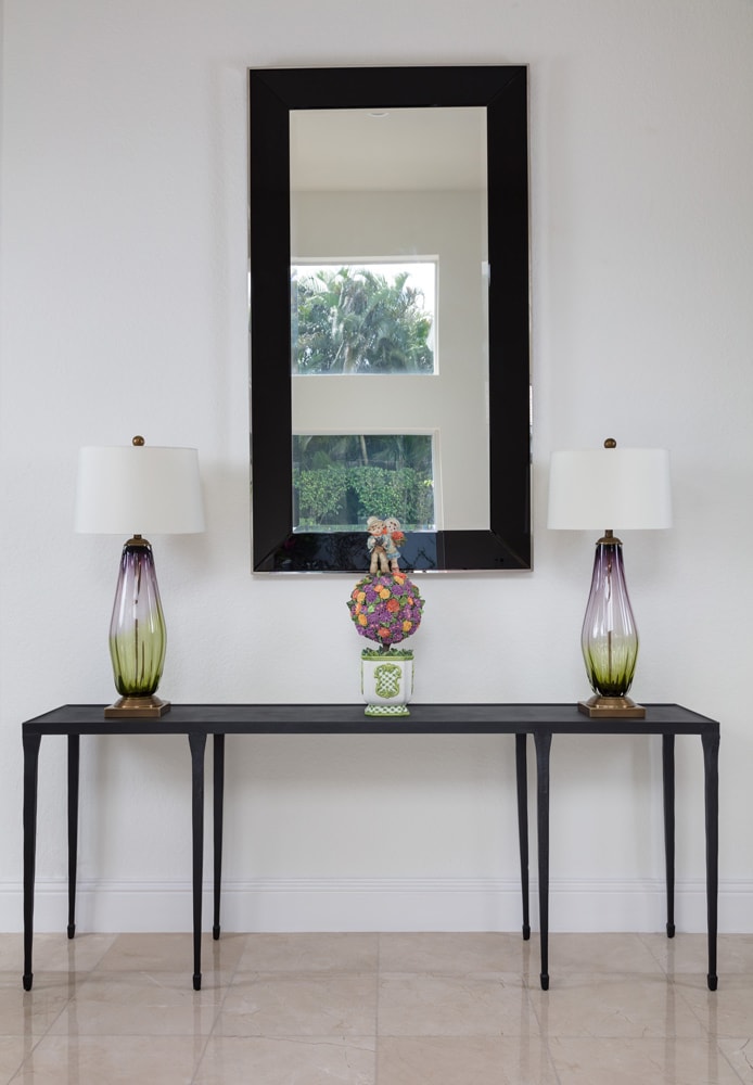 Hallway table in a Boca Raton home by designed by Annette Jaffe Interiors