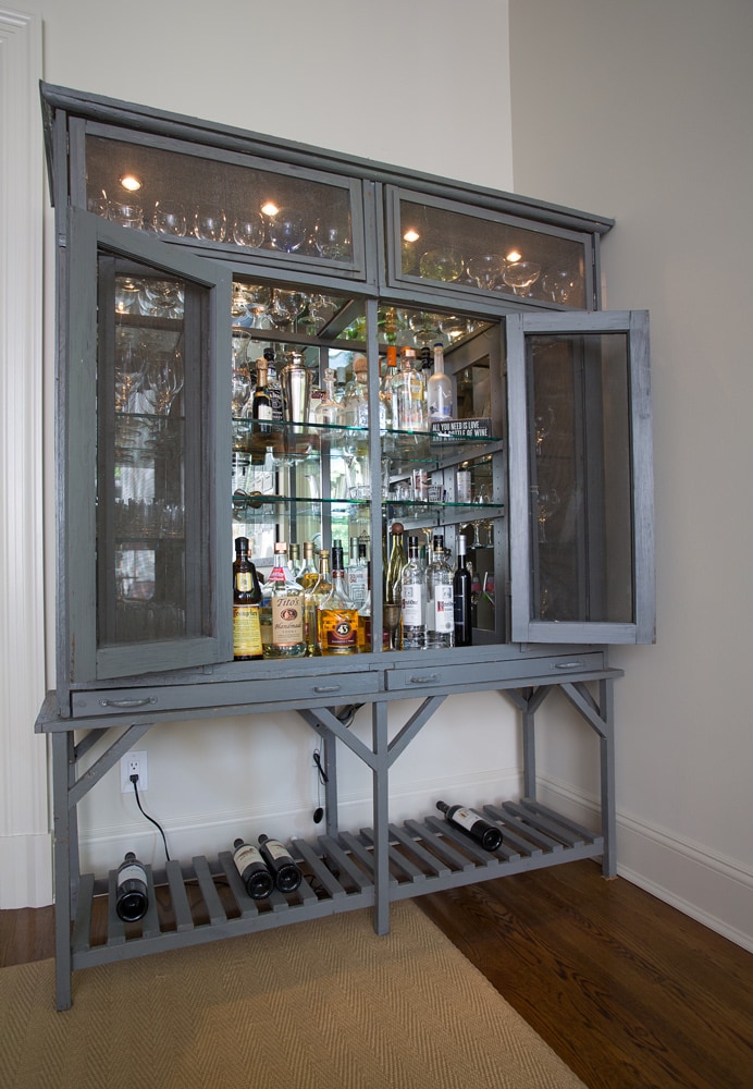 Antique birdcage bar cabinet in Harriman estates designed by Annette Jaffe Interiors