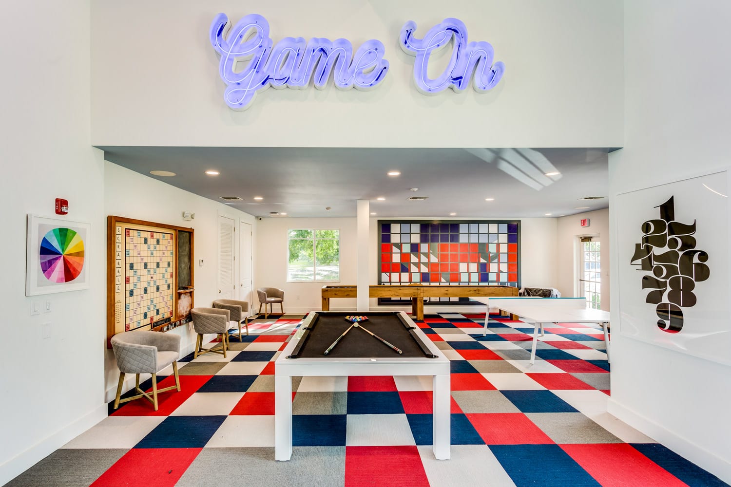 Game room interiors in Arbor Oaks apartment building designed by Annette Jaffe Interiors