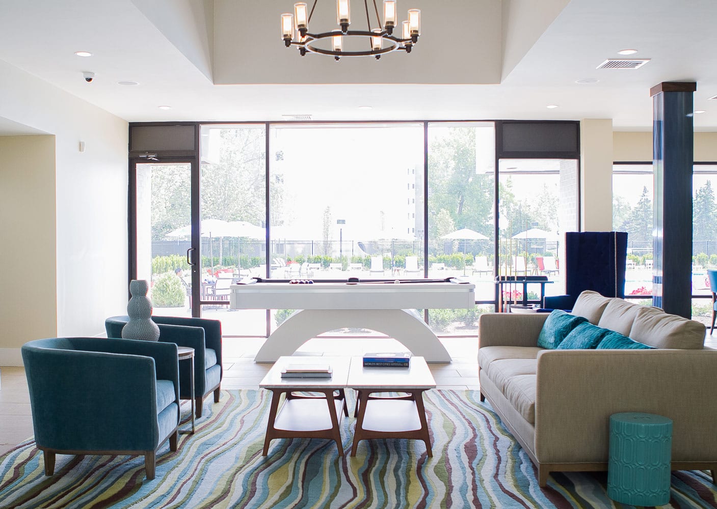 Century Hills apartment clubhouse seating area design