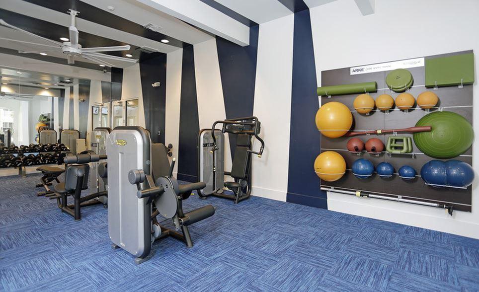 Grandeville at River Place apartment fitness center interiors by Annette Jaffe