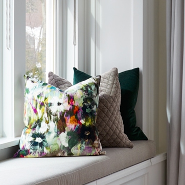 Window seat cushion in a Long Island home designed by Annette Jaffe