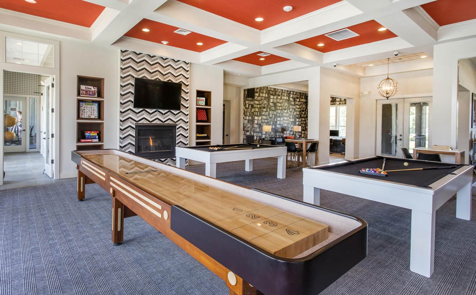 Game room designed by Annette Jaffe Interiors in Jefferson at Westtown apartment
