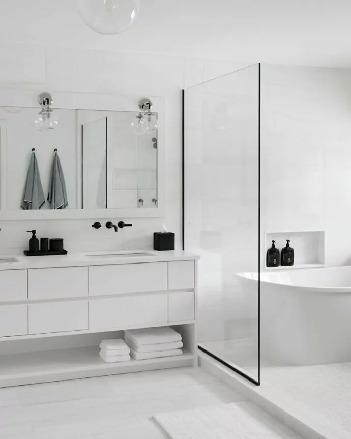 White bathroom design in a Sands Point home by Annette Jaffe Interiors
