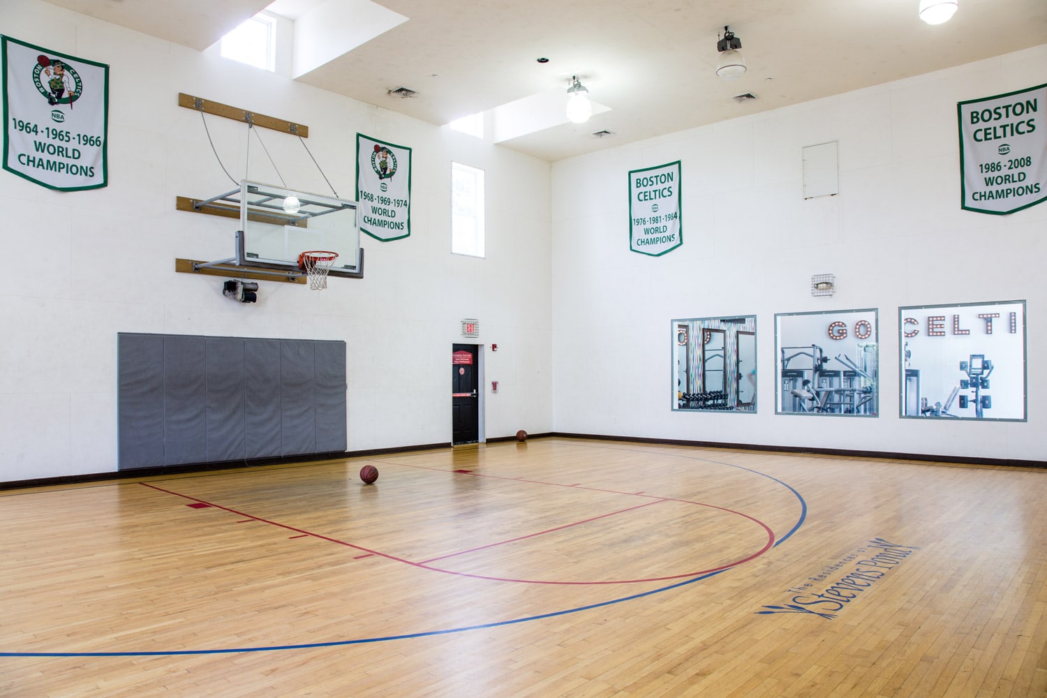 Residences at Stevens Pond basketball court designed by Annette Jaffe Interiors