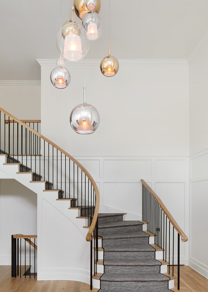 Entryway staircase in a Sands Point home designed by Annette Jaffe Interiors