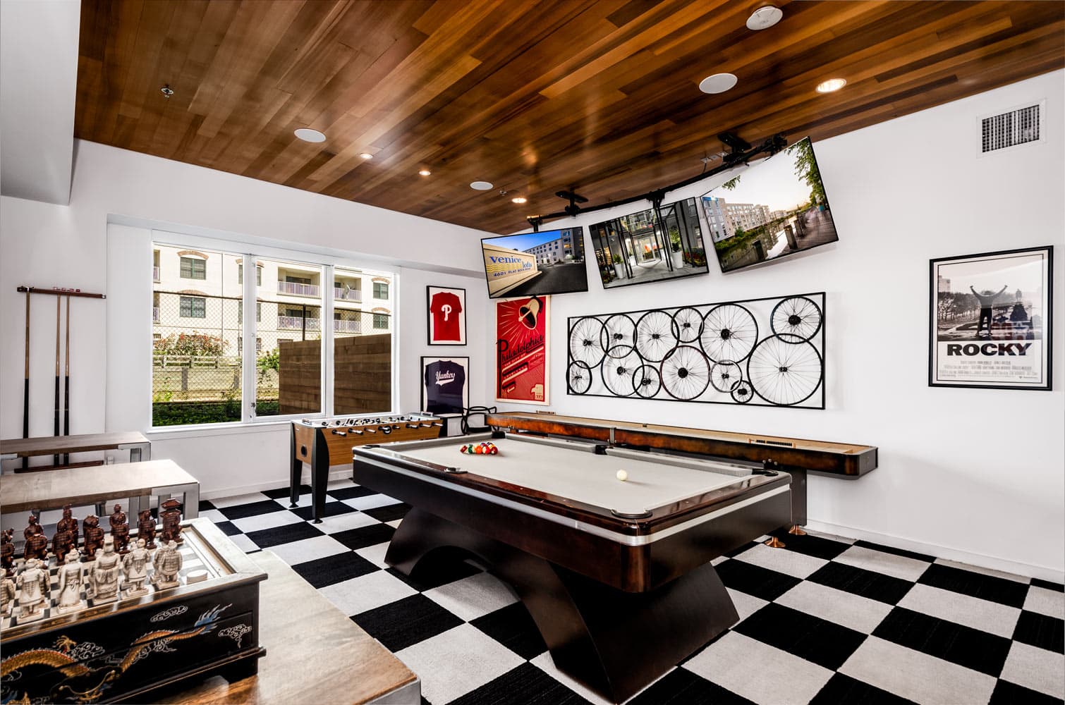 Game Room with billiards table and shuffle board